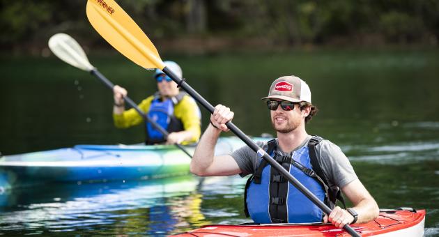 Man & Woman Kayaking in Minocqua