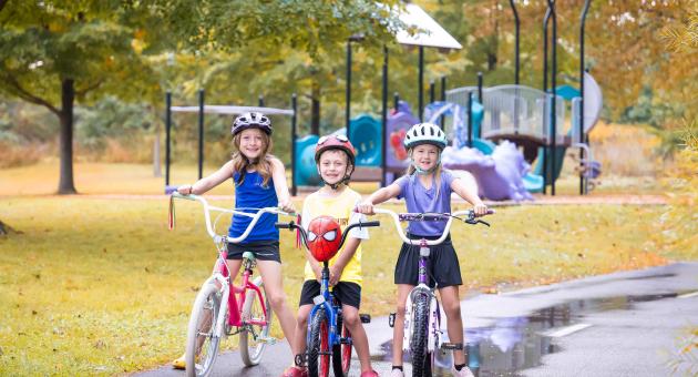 Young bike riders on trail