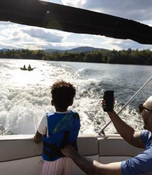 Family of Four Tubing and Boating on Lake George