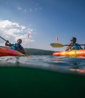 A couple kayaking on Lake George