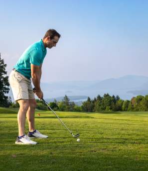 A man golfing at Top of the World