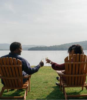 Couple sitting by the lake