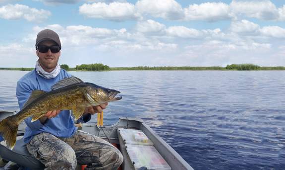 Fisherman with walleye