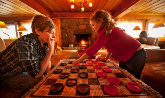 Children playing checkers