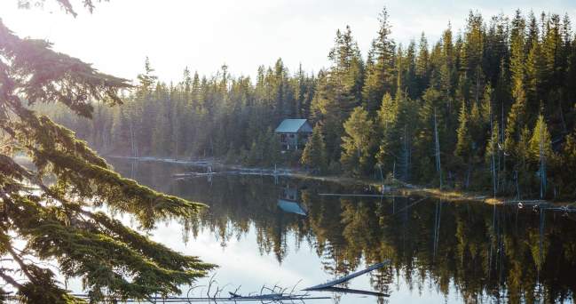 View of the lake and the Elk Lake Hut on the Sunshing Coast Trail.
