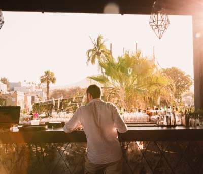 Man at Bar During Late Afternoon