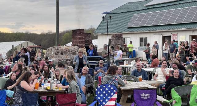 The crowd at Stoney Acres Pizza farm enjoys the day.