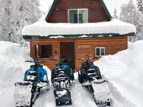 Snowmachines at the Cabin