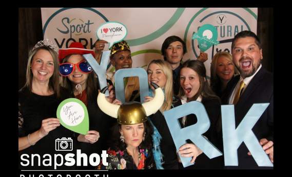 EY staff at ATIE photobooth