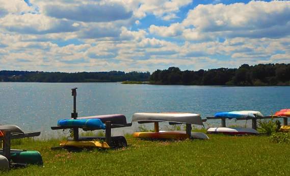 kayaks and canoes lined up at codorus state park