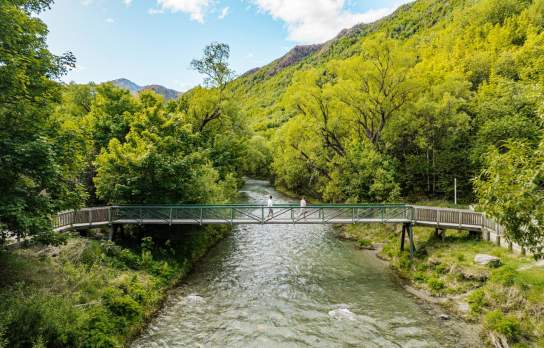 A couple of mates walking the Arrow River Trail in summer