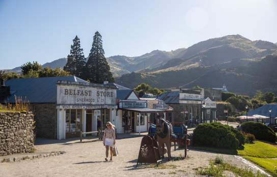 Women walking through Cromwell's Heritage Precinct
