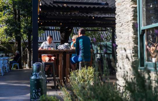 Cyclist enjoying a drink at Gantley's Tavern in Arthur's Point