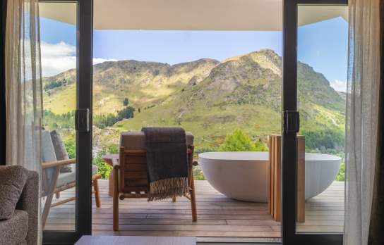 A landscape image of Coronet Ridge Resort Shotover View Room on a sunny day