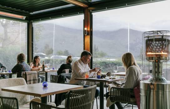 Diners enjoying French dishes à la carte at Bistro Gentil in Wānaka