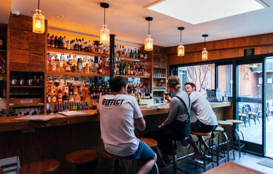 Friends enjoying a drink at Cork Bar in Wānaka