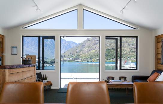View of Lake Whakatipu from inside the Wet Jacket tasting room at Queenstown Marina