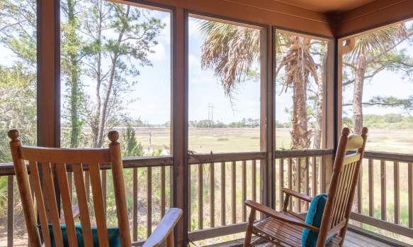 Cottage Porch View with Rocking Chairs
