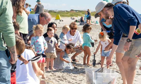 Young children learning all about the ocean in a youth education program "Wee Wild Ones".