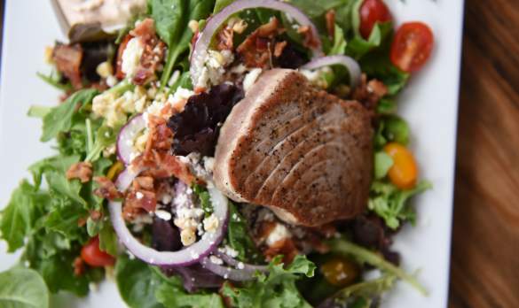 The grilled tuna & bacon salad from the Blue Water Grill Restaurant in the Pirate's Cove Marina.