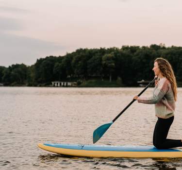 Female Paddleboarder at Lake Sara