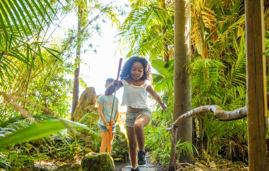 Kids playing mini golf at Wanneroo Botanic Gardens