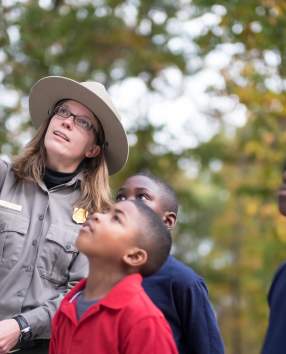 Ranger showing kids birds