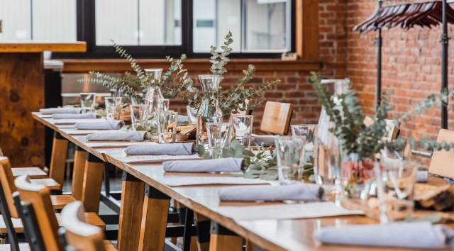 table set with beautiful flowers and wedding placements