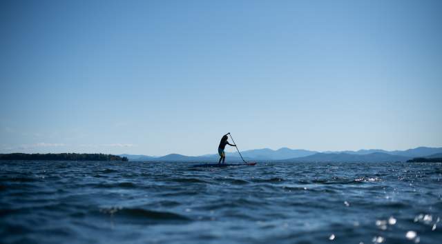 paddleboarder on Lake Champlain
