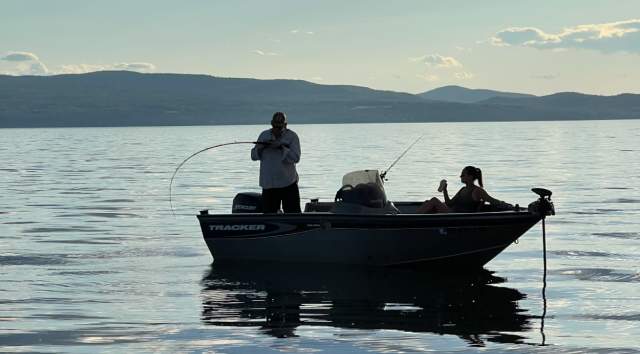 fishing on skipper on Lake Champlain in the summer