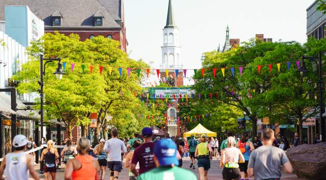 Photo of Church Street full of tourists and people running the Burlington City Marathon