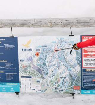 Consulting the ski map at Solitude Mountain Resort