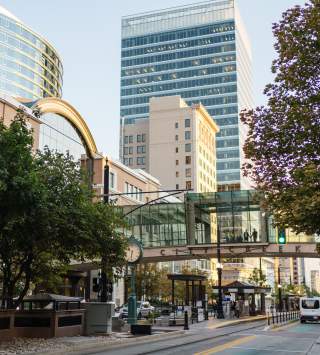 View looking south on main street in Salt Lake in summer time showing the street bridge at City Creek Center