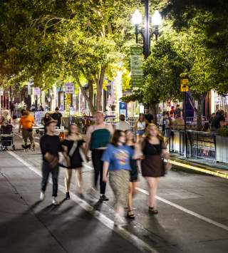 A group walking down Main Street during 2022’s Open Streets.
