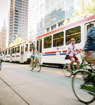 GREENbike Alongside Trax in downtown Salt Lake