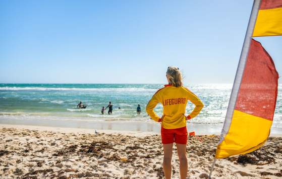 Surf life saver at beach in Yanchep, Sunset Coast