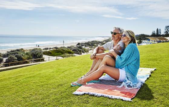 Couple overlooking the ocean, Scarborough