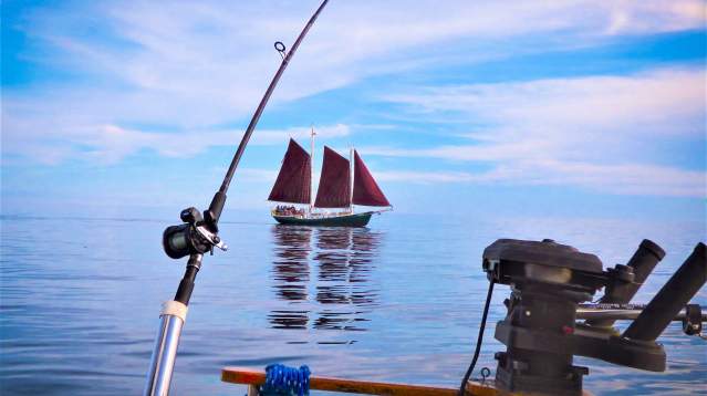 Back of fishing boat and the Hjordis on Lake Superior