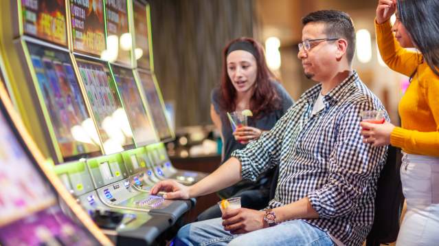 People playing casino games at Grand Portage Lodge and Casino
