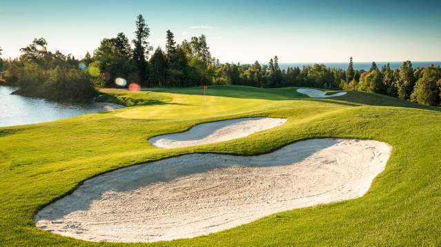 Golf course with lake views