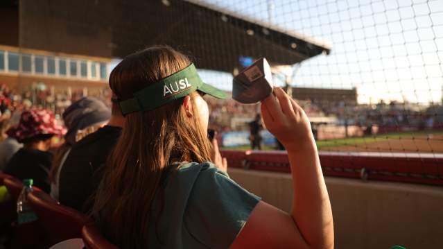 A close up of a woman's AUSL visor