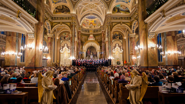 interior of a traditional catholic basilica during christmas celebrations