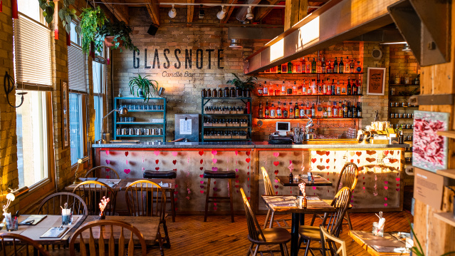 interior view seating and bar of Glassnote Candle Bar