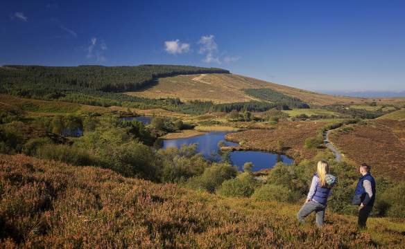couple enjoying the view of Gortin Lake