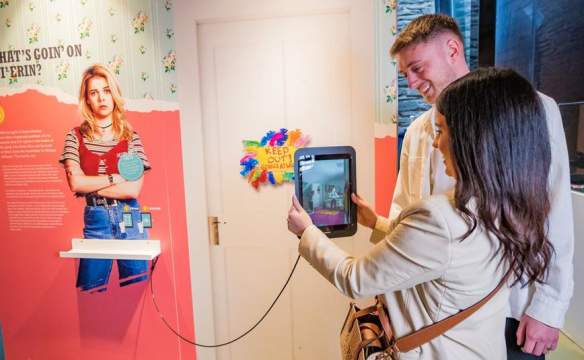 Guests interact with exhibitions at the Derry Girls Exhibition
