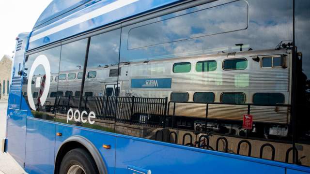 PACE Bus and a Metra Train at the Aurora Transportation Center in Aurora, Illinois