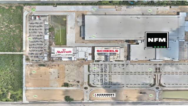 CedarView Development satellite view with business logos above development spots marking their future locations