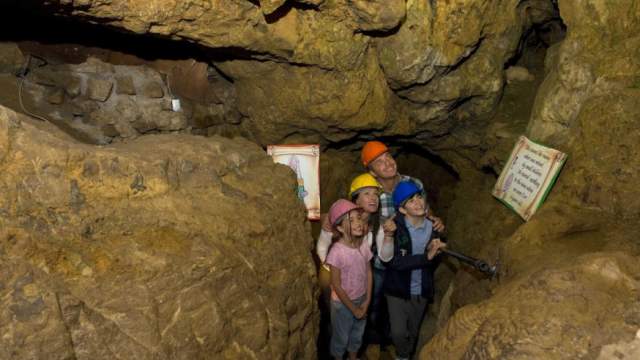 Visitors in the Great Orme Mines looking up
