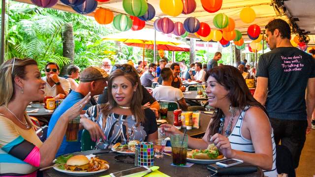 Transgender women enjoy a meal at Rosie's Bar & Grill in Wilton Manors, FL