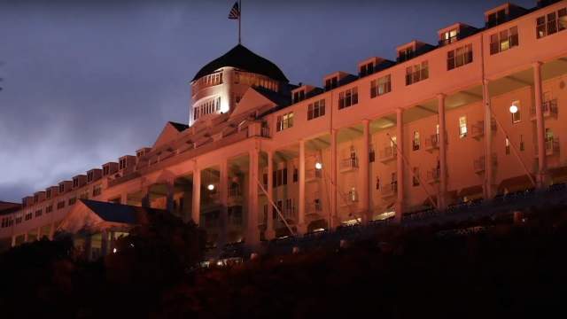 Grand Hotel lit up orange for Halloween.